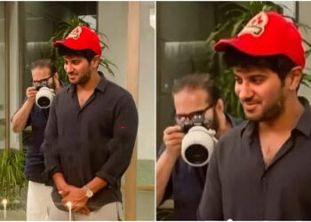 പിറന്നാൾ കേക്ക് മുറിച്ച് ദുൽഖർ, പുറകിൽ ഫോട്ടോഗ്രാഫറായി മമ്മൂട്ടി; ചിത്രം വൈറൽ
