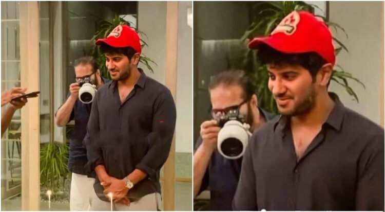 പിറന്നാൾ കേക്ക് മുറിച്ച് ദുൽഖർ, പുറകിൽ ഫോട്ടോഗ്രാഫറായി മമ്മൂട്ടി; ചിത്രം വൈറൽ